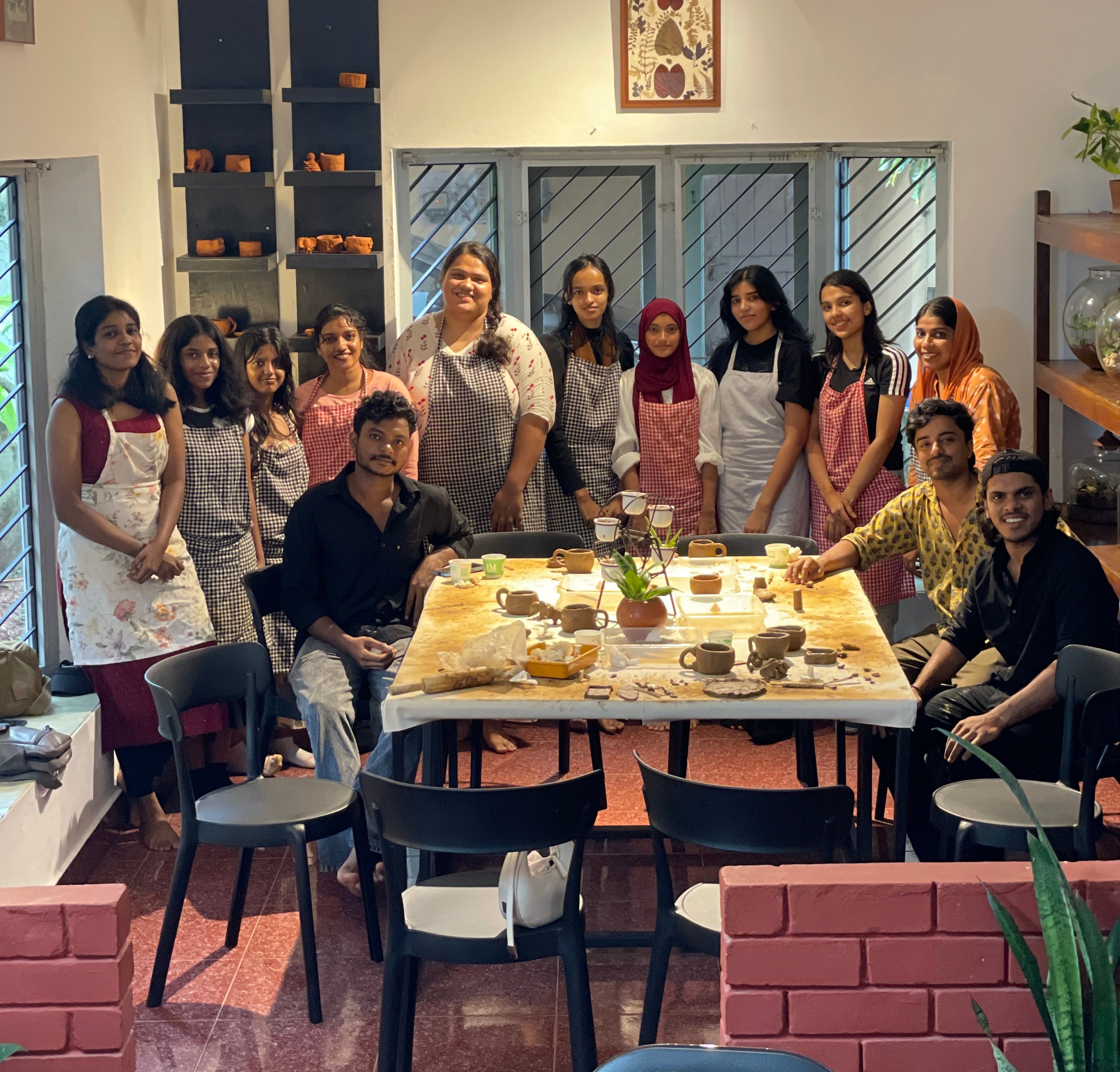 Group of people attending terracotta workshop